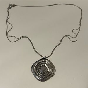Charming Charlie Silver Tone Necklace with Spiral Pendant